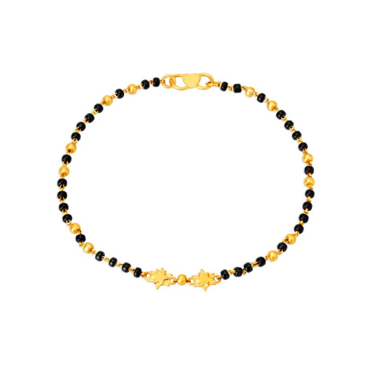 PAIR OF 22KT YELLOW GOLD BRACELETS WITH BLACK BEADS